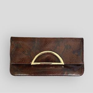 White House Black Market snakeskin clutch